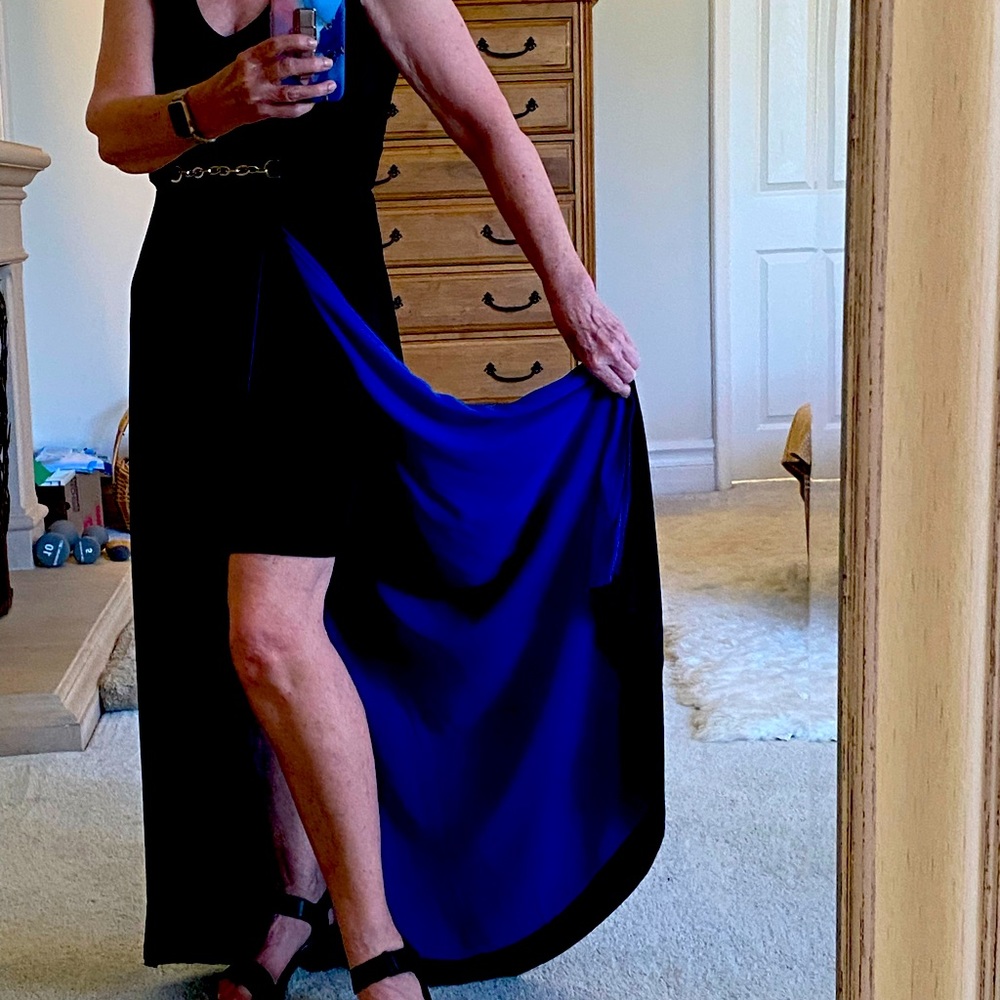 NWT. Mini skirt/long black skirt and train.